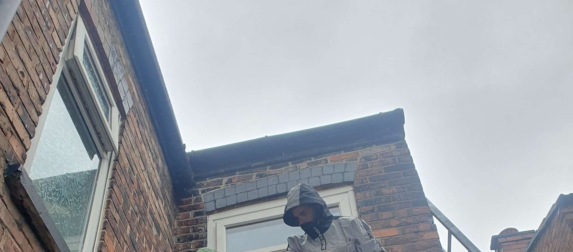 Temporary fix to leaking roof in Didsbury.